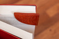 Bild in Galerie-Betrachter laden, Lesezeichen aus Leder mit Lochmuster Lederaccessoire Lederlesezeichen Ledermanufaktur handgenäht im Sattlerstich